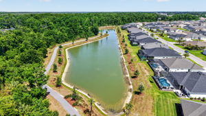 Aerial Side Elevation with Water Views and Walking Trails
