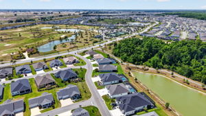 Aerial Side Elevation with Water Views, Walking Trails, Nearby Franklin Recreation Center, Jubilee Putting Course, and Mickylee Pitch and Putt