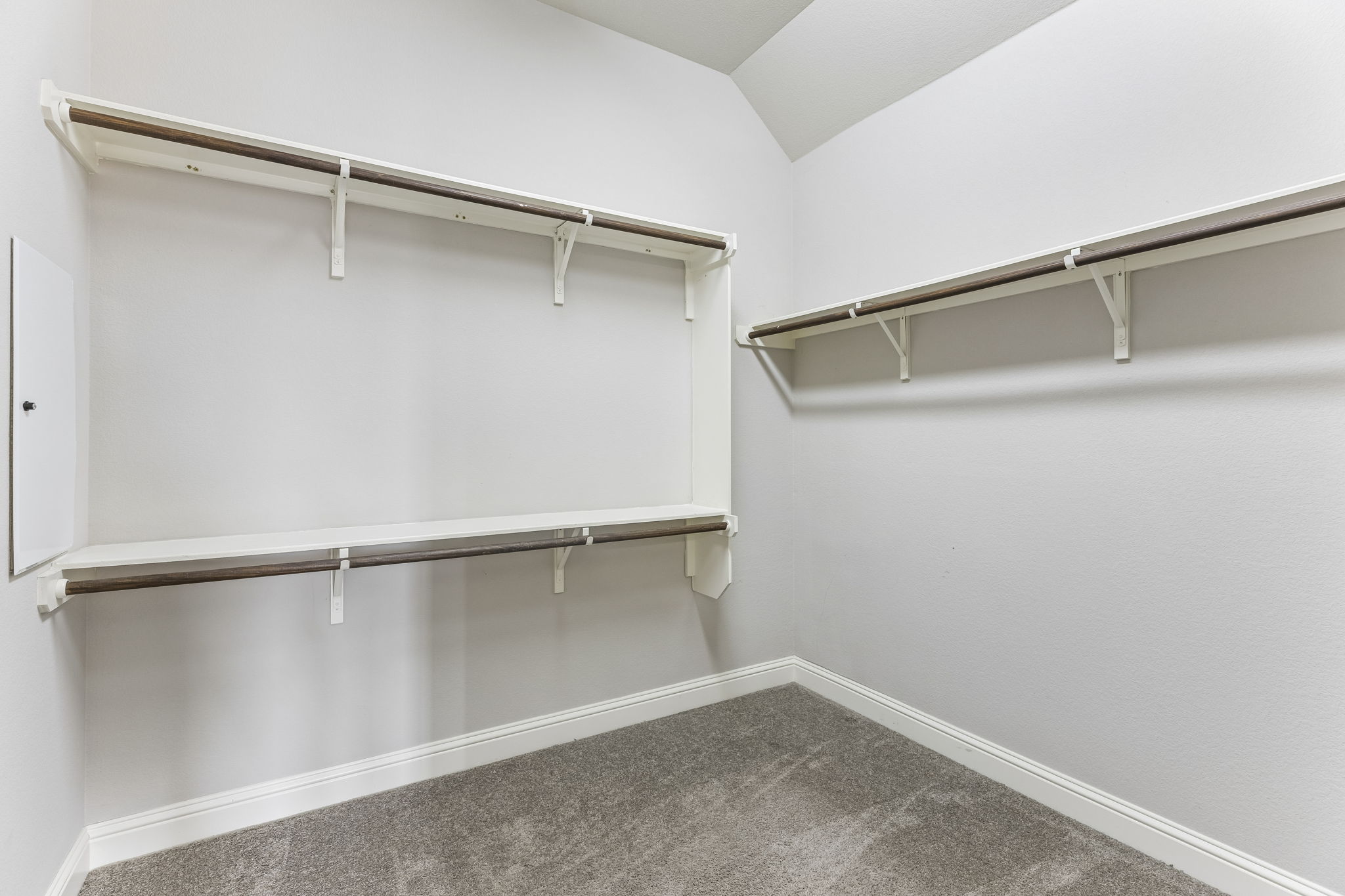 Downstairs Primary Walk-in Closet