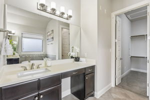 Downstairs Primary Bathroom With Walk-in Closet