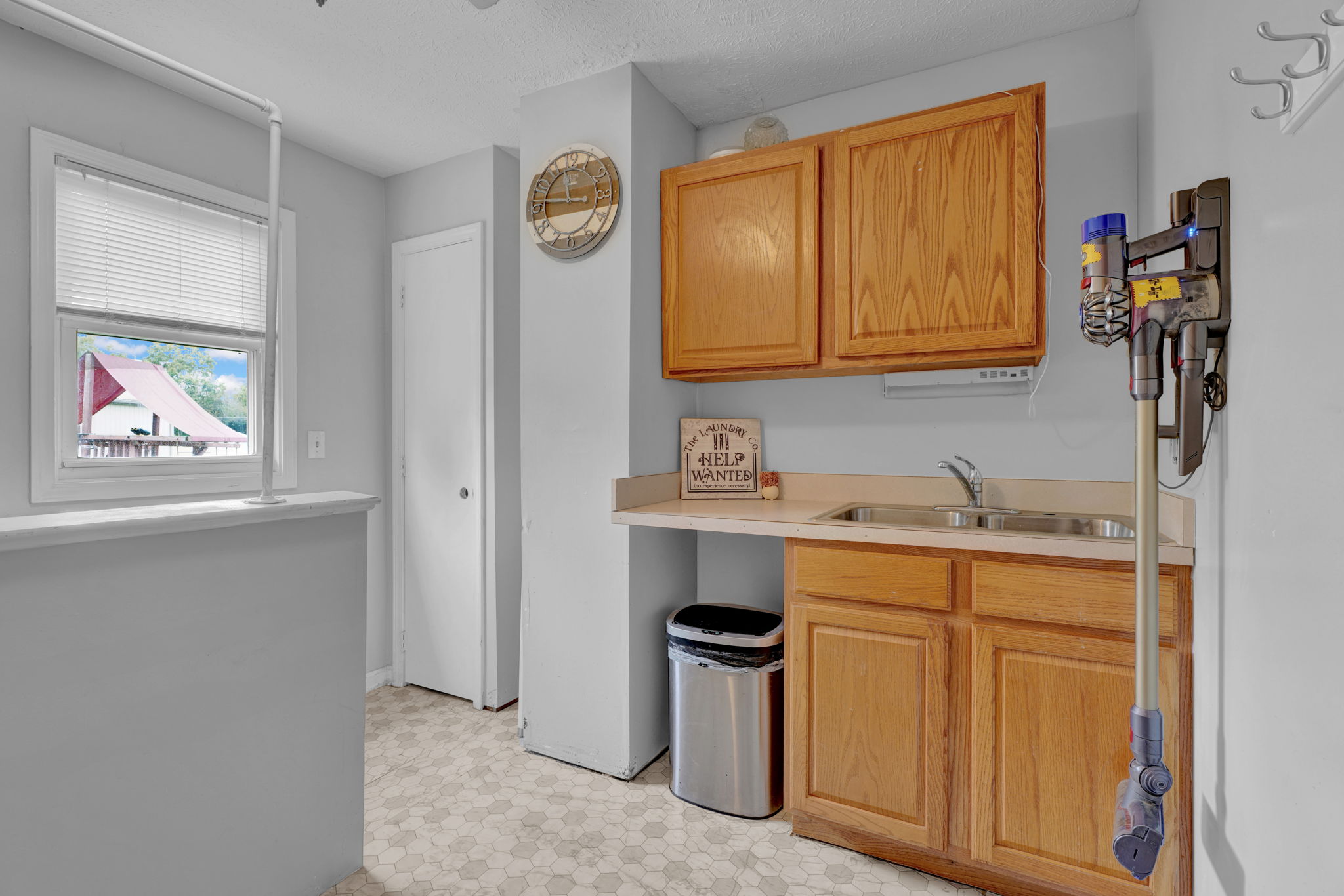 Sink and cabinets in laundry