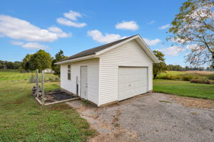 Detached garage w/newer siding and window