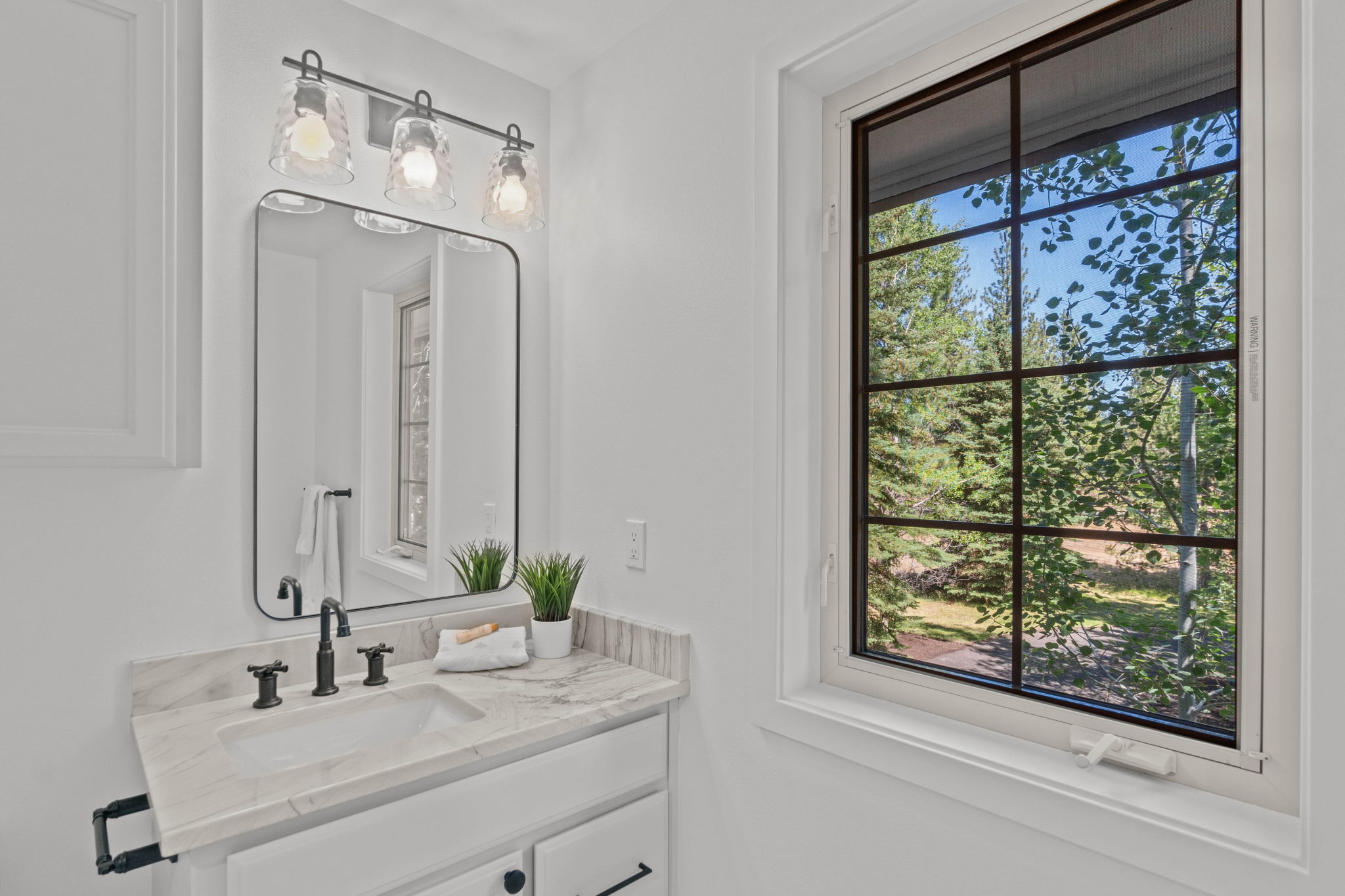 Beautifully updated Beautifully updated guest en-suite bathroom #2, quartzite counters, undermount sink, new plumbing & light fixtures