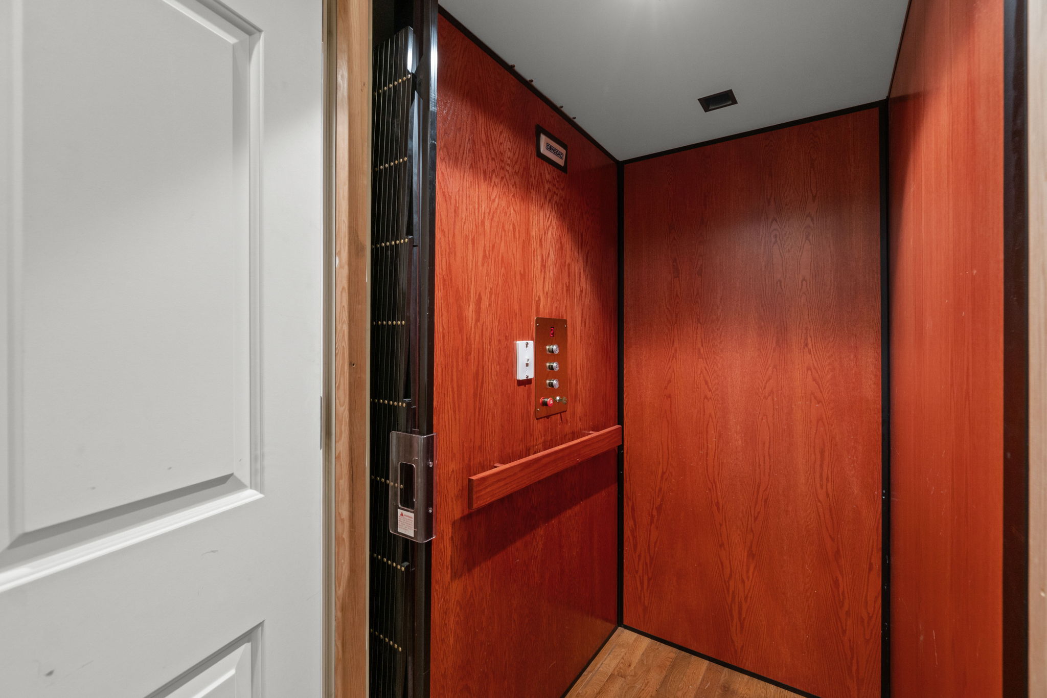 Beautiful wood lined elevator serving all 3 levels