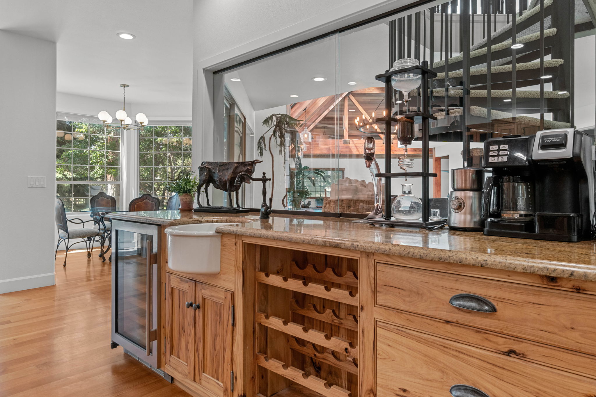 Wet bar with SubZero Wine Fridge, wine rack,  & round farmhouse sink