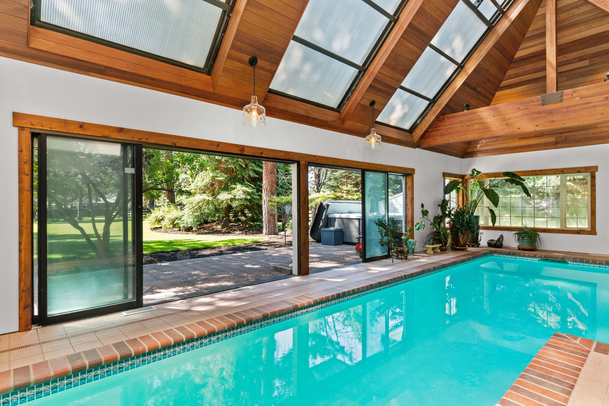 Accordion doors to rear patio & oversized opening skylights