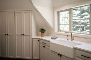 Beautiful laundry room with storage & counter space