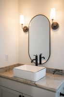 All new powder bath with vessel sink & octogon tiled floors