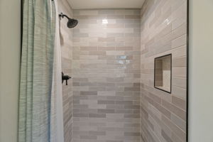 En-suite bathroom #2, new plumbing &, zero threshold, high-end subway tiled shower