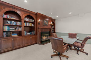 Cherry wood built-ins and wood burning fireplace