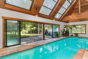 Accordion doors to rear patio & oversized opening skylights