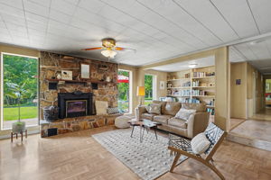 Warm and inviting Great Room with wood stove