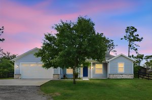 6990 Buckhorn Trail_01 day to dusk.jpeg