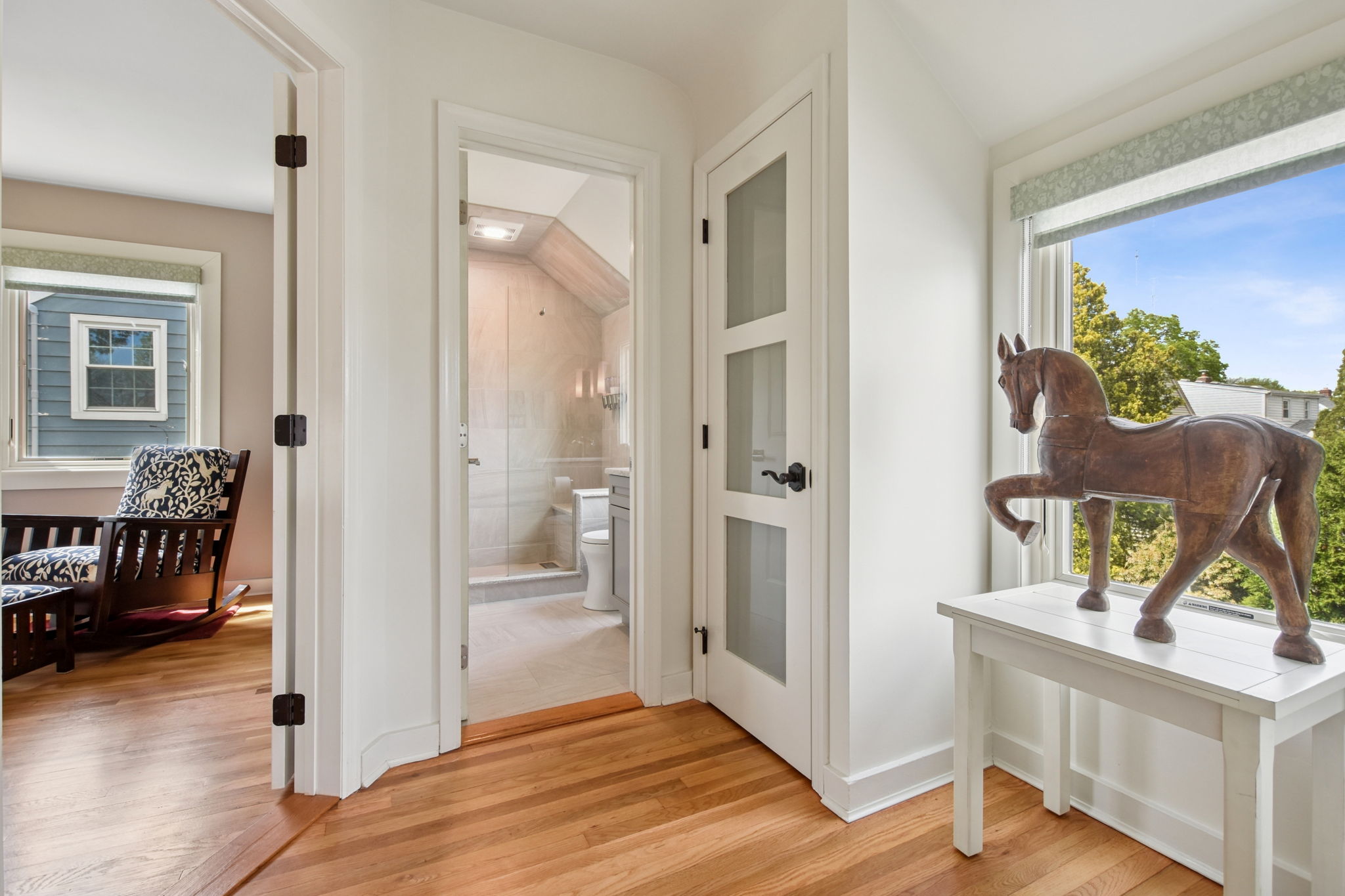Lovely 2nd floor landing with beautiful picture window and new glass paneled doors - so light and refreshing!