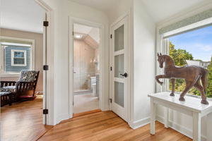 Lovely 2nd floor landing with beautiful picture window and new glass paneled doors - so light and refreshing!
