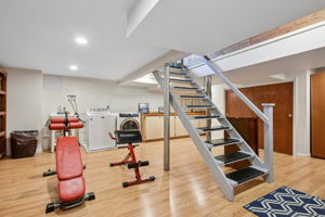 Clean, finished, and full of possibilities—this lower level adapts to you.