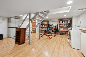 Bright, beautifully finished, and full of potential—this lower level is currently a home gym, but it’s ready to become whatever your lifestyle calls for: rec room, guest suite, studio, or serene retreat.
