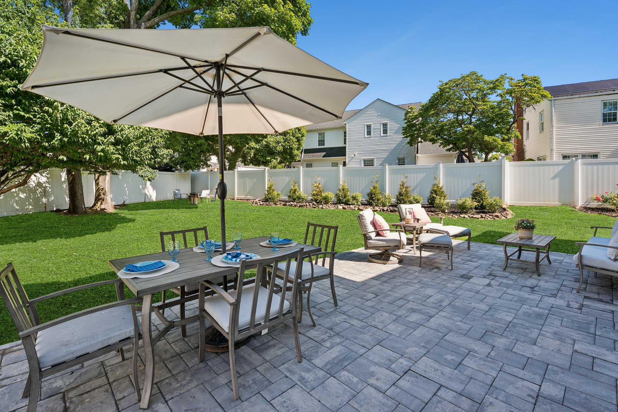 Patio and landscaped back yard