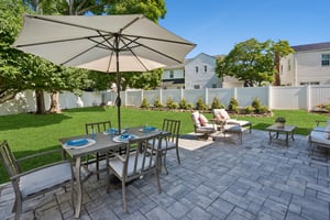 Patio and landscaped back yard