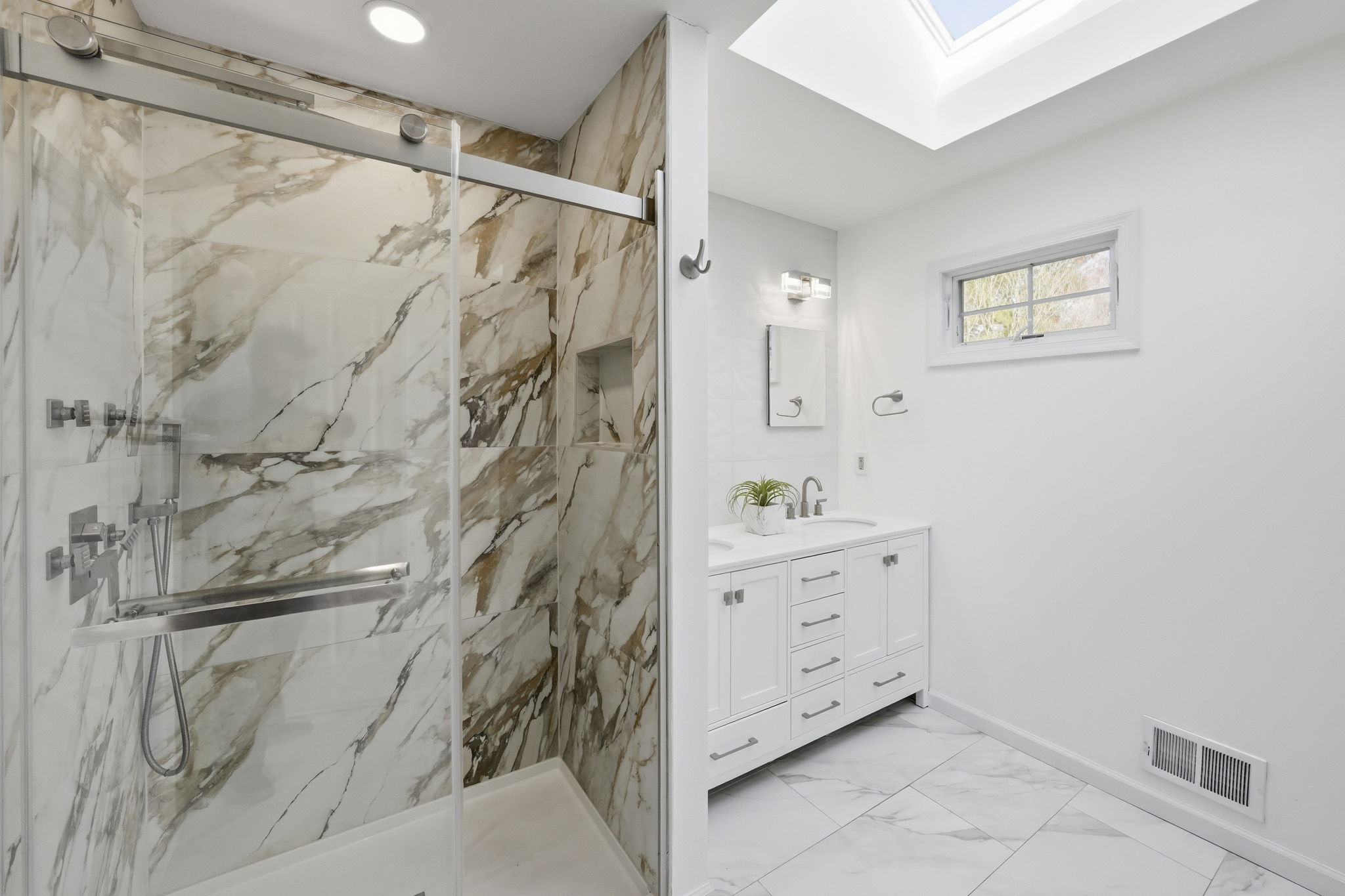 newly renovated modern bathroom double sink