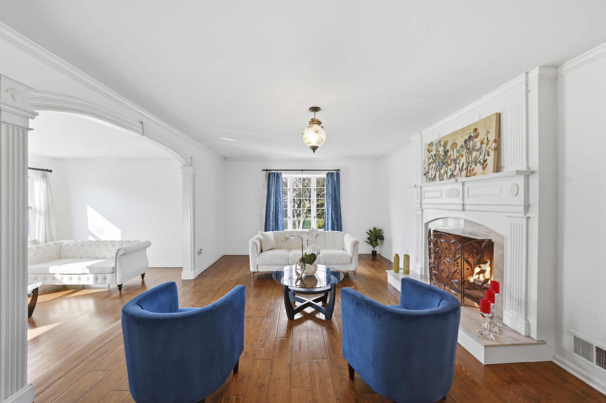 Open floor plan with hardwood flooring