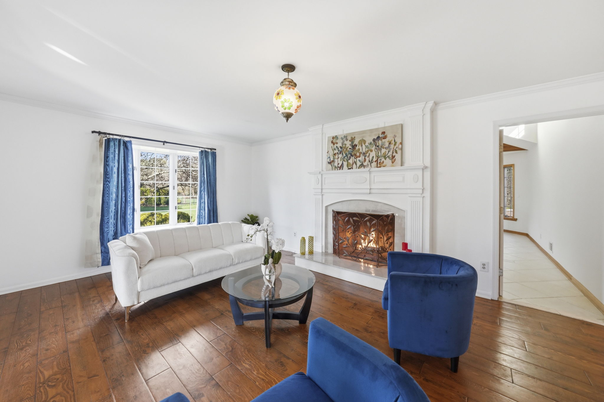 living room with wood burning fireplace