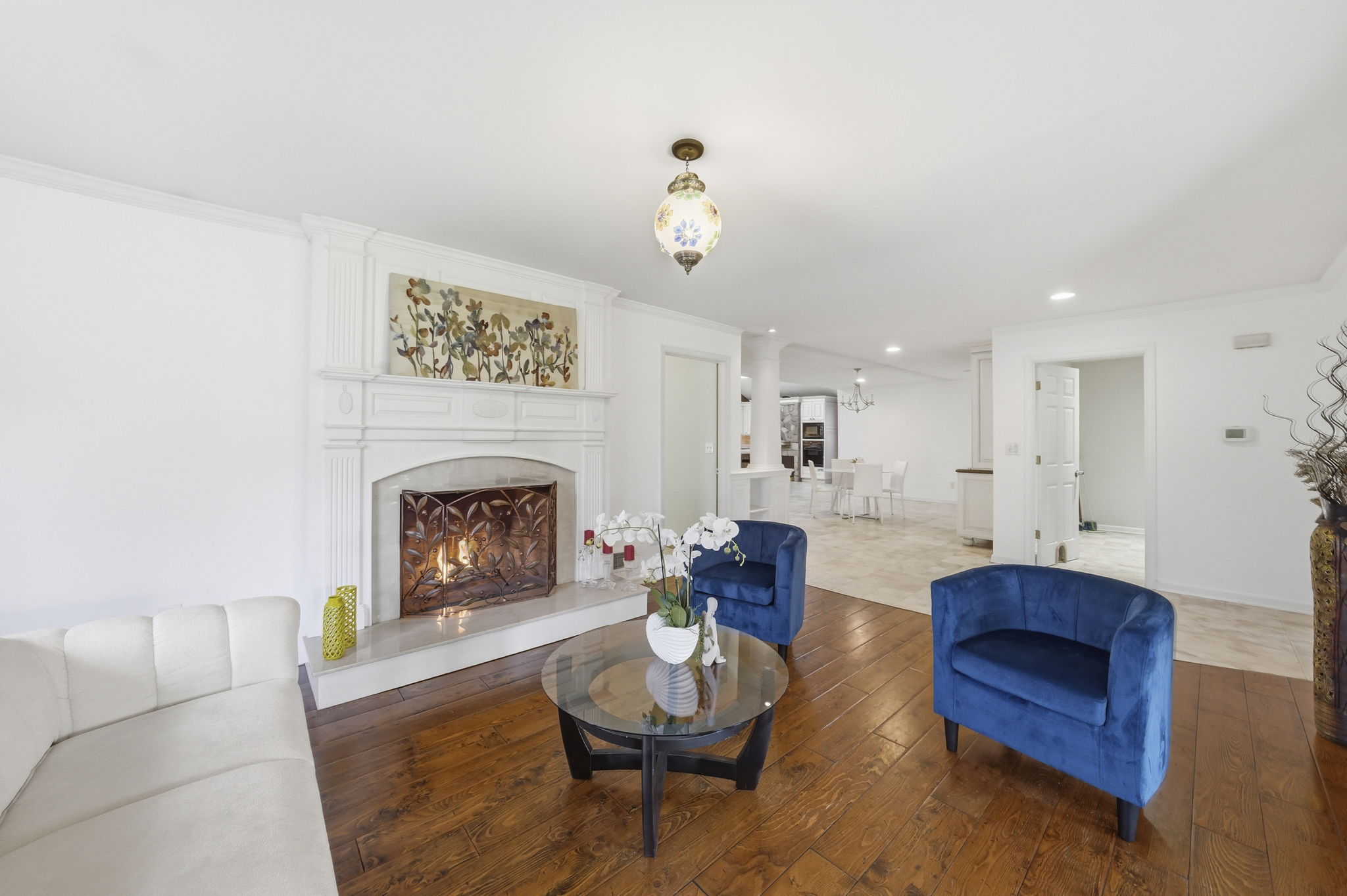 Open floor plan with hardwood flooring