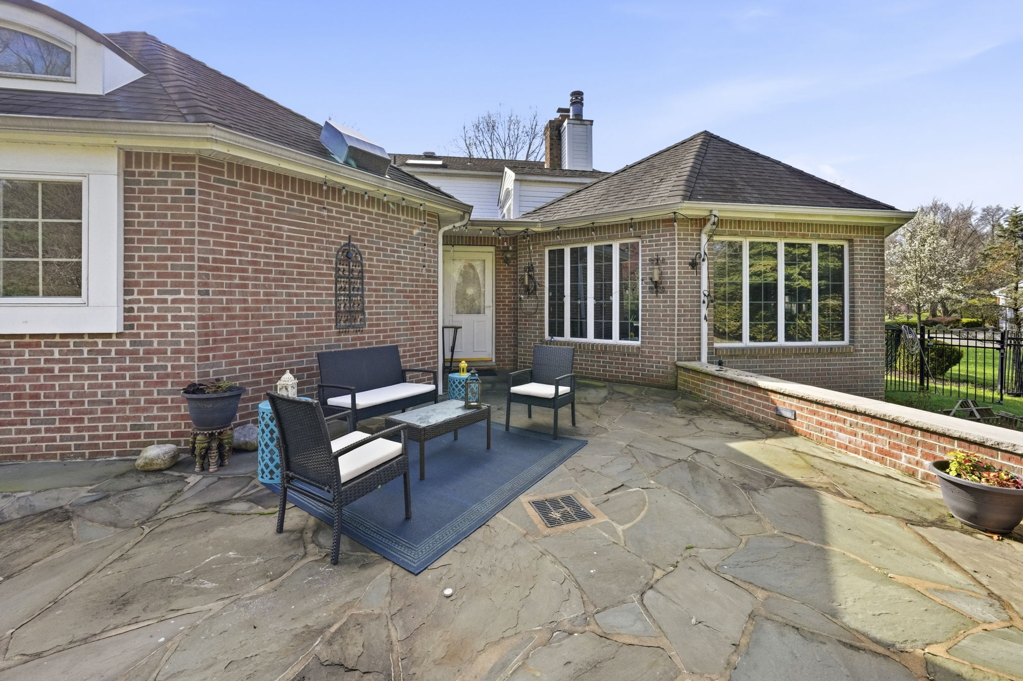 Blue stone patio with private backyard