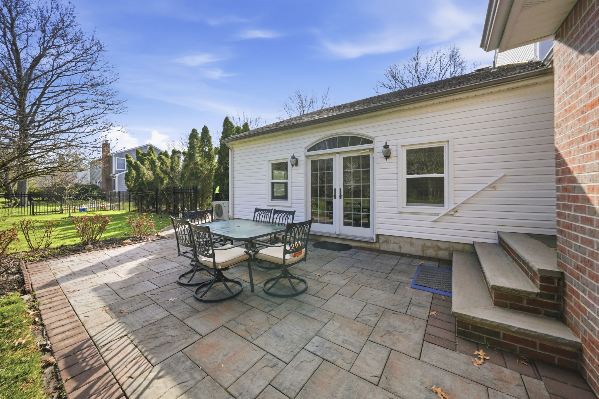 second patio with entry to the first floor room and kitchen