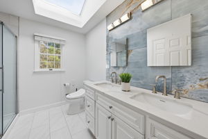 newly renovated modern bathroom double sink