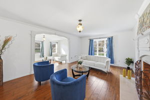living room with wood burning fireplace