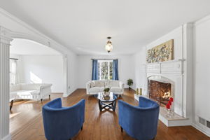 Open floor plan with hardwood flooring