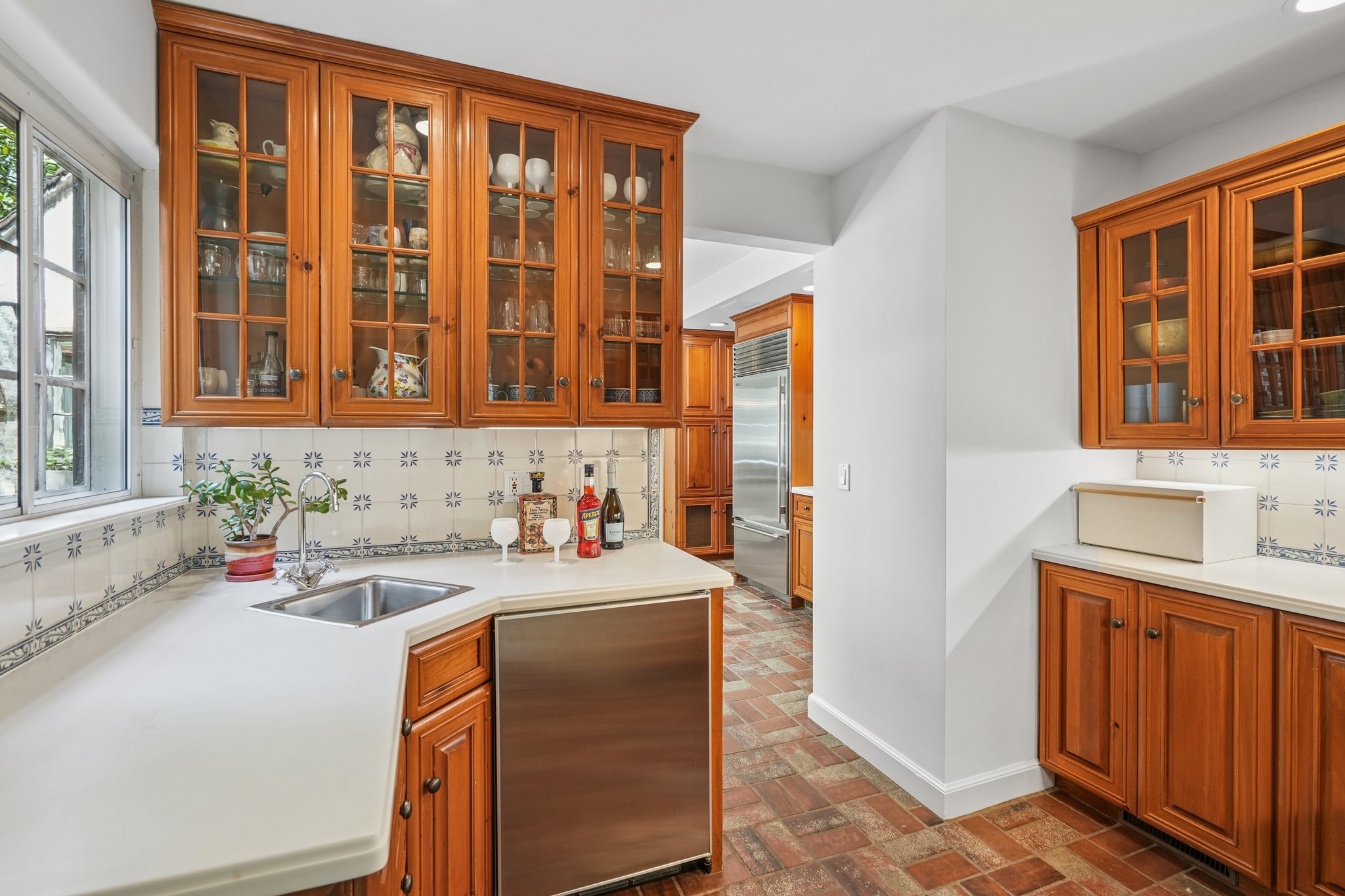 The butler’s pantry offers generous storage and countertop space—ideal for every appliance and entertaining essential.