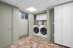 Laundry day just got a glow-up. With a full bath right alongside, this space is equal parts function and comfort.