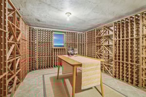 For the bottles worth saving and the nights that call for something special. This wine room has just enough drama to feel like a secret.