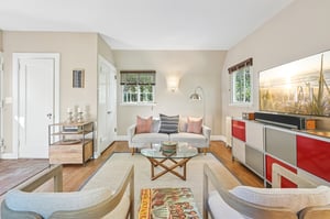 ☀️ Light on three sides. Screen time straight ahead. This family room wraps you in sunshine by day, and your favorite shows by night—the perfect place to binge, nap, and do it all over again.