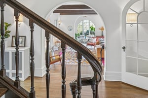 Up the curved staircase, the 2nd floor unfolds— four bedrooms, two baths, and a sitting room ready for whatever the day (or night) brings.