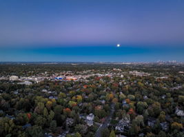 Full moon over downtown - under a mile away