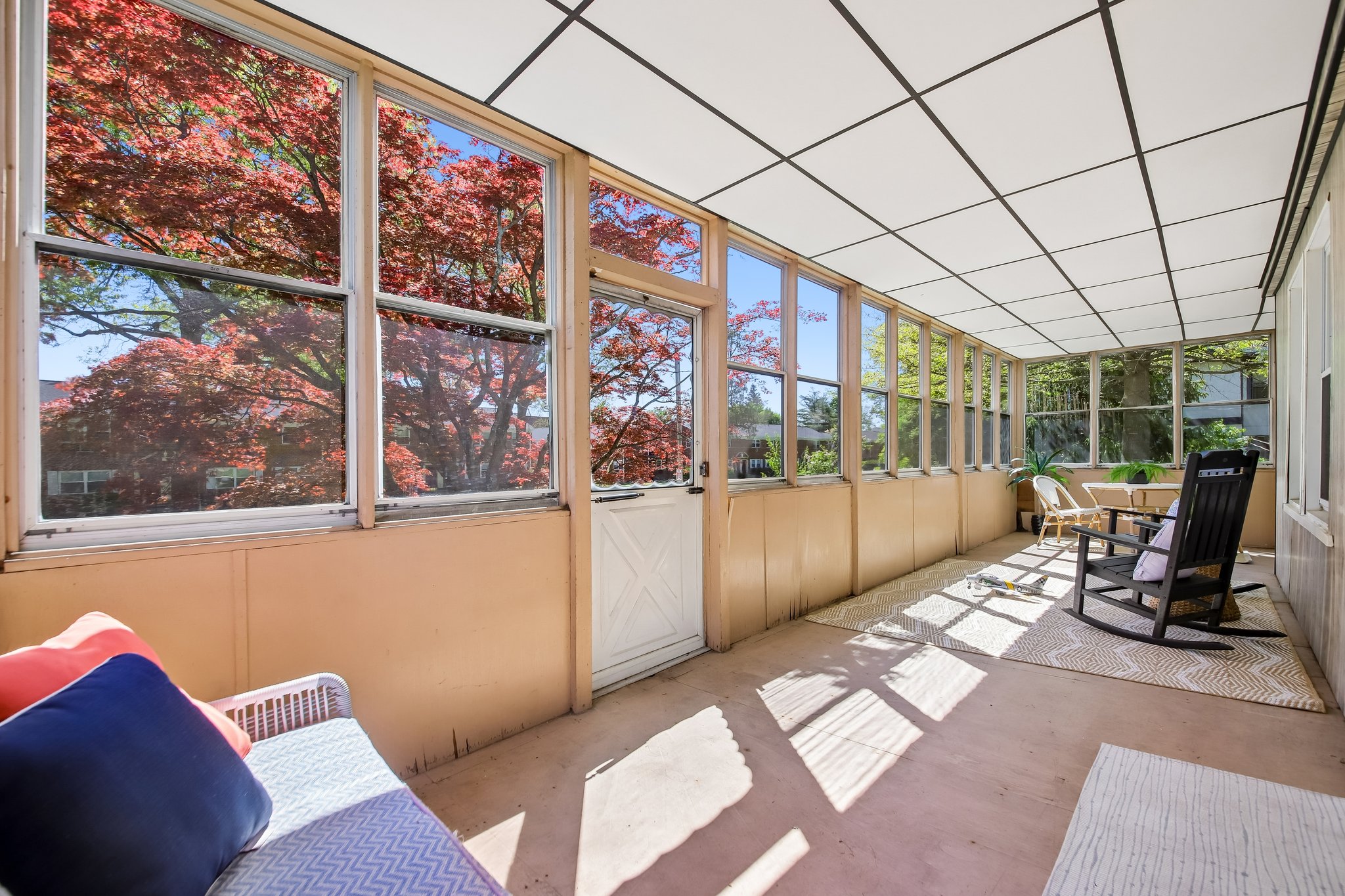Watching the world go by on the quiet porch, blocks from the bustle of Downtown Montclair.