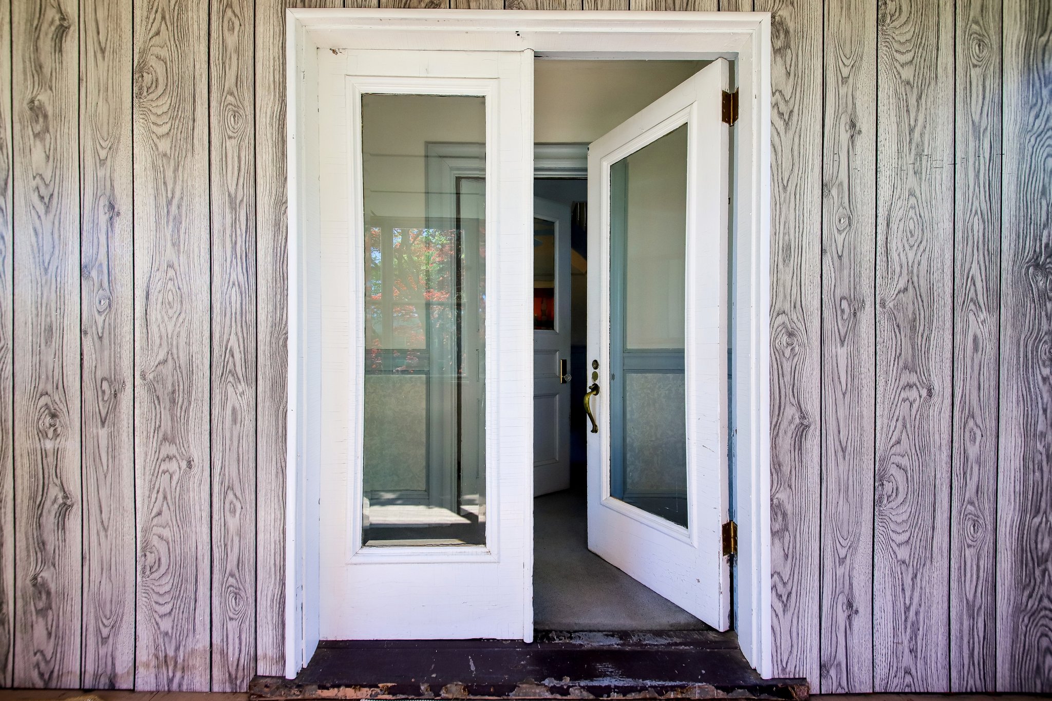 Imagine all the love that’s passed through these doors-sunlight, seasons, and generations welcomed home through original full-lite doors, crafted in a time when even the simplest details were built to last.
