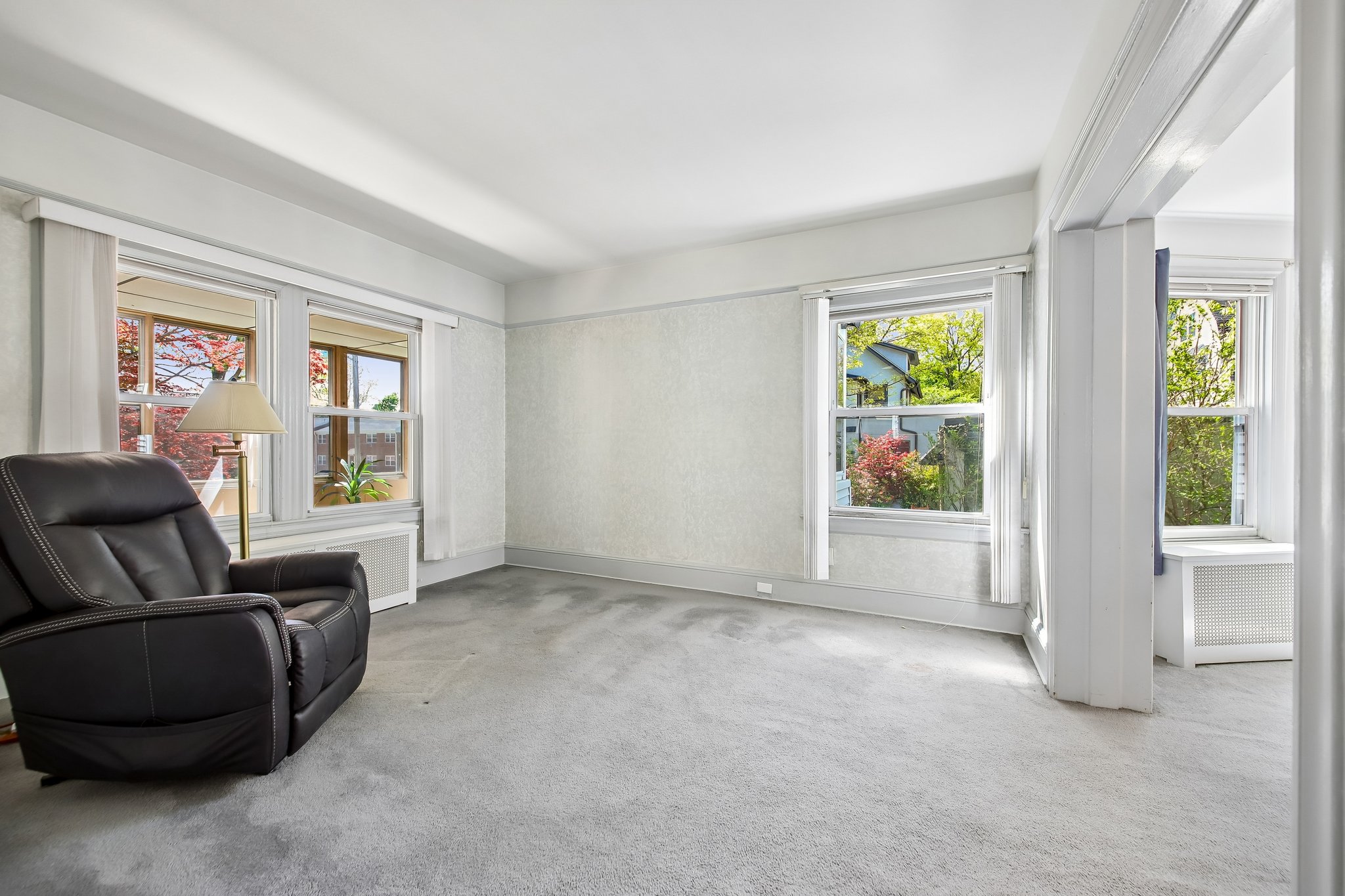 Wonderful flow and scale with some updated windows & original moldings and detail.