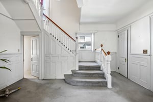 Beneath it all? Wood floors!  Likely oak anchoring the first floor, and native pine upstairs-materials chosen not just for beauty, but for longevity. Waiting, quite patiently, to be uncovered again.