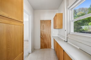 Butler's Pantry. Full Bath at end.