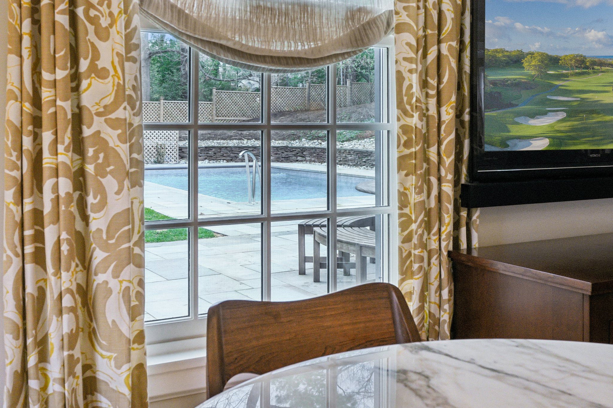 View of pool from living room.