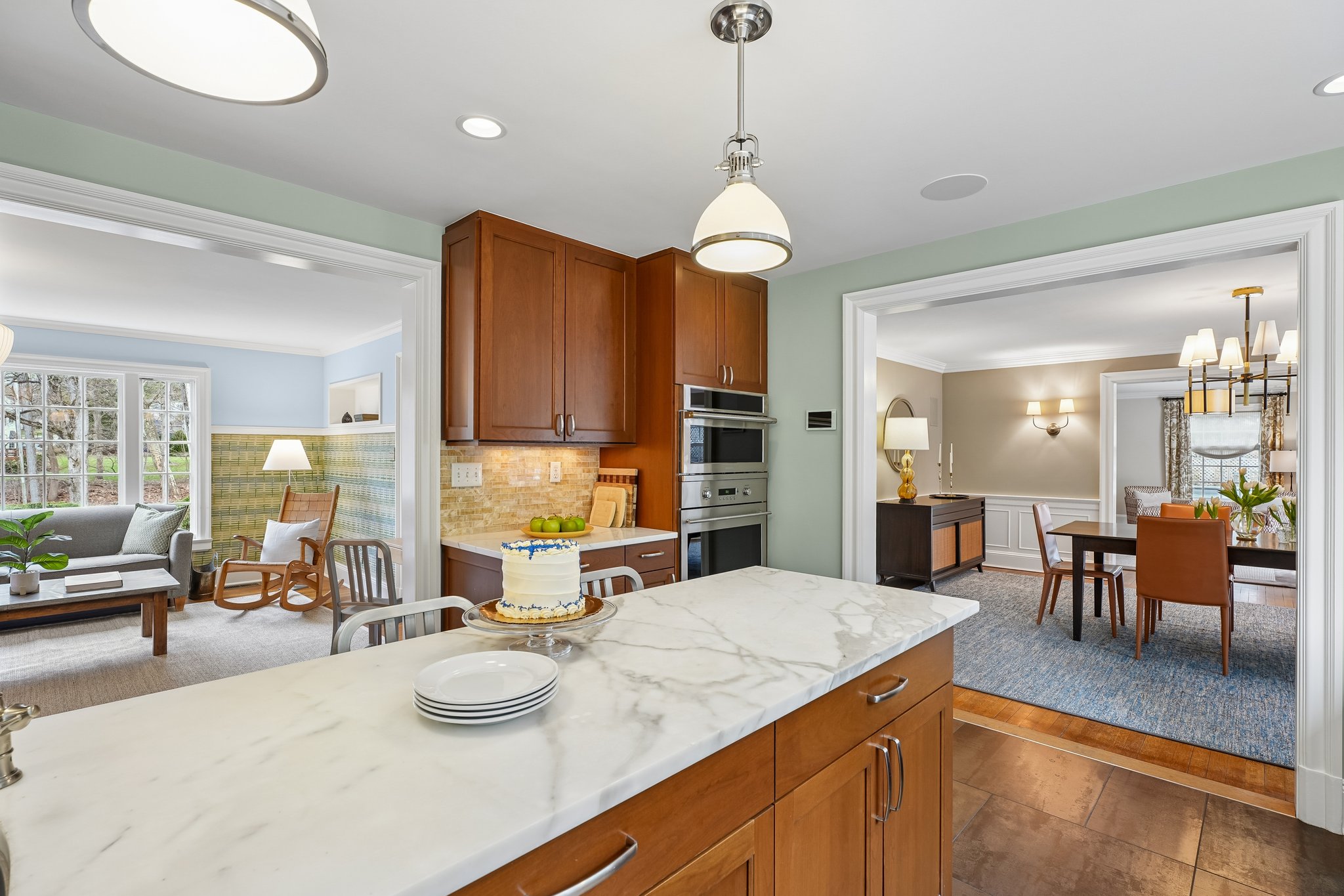 At the heart of it all, a beautifully designed kitchen with a generous island anchors the home - seamlessly connected to the dining room and family room, making everyday living and entertaining feel effortless.