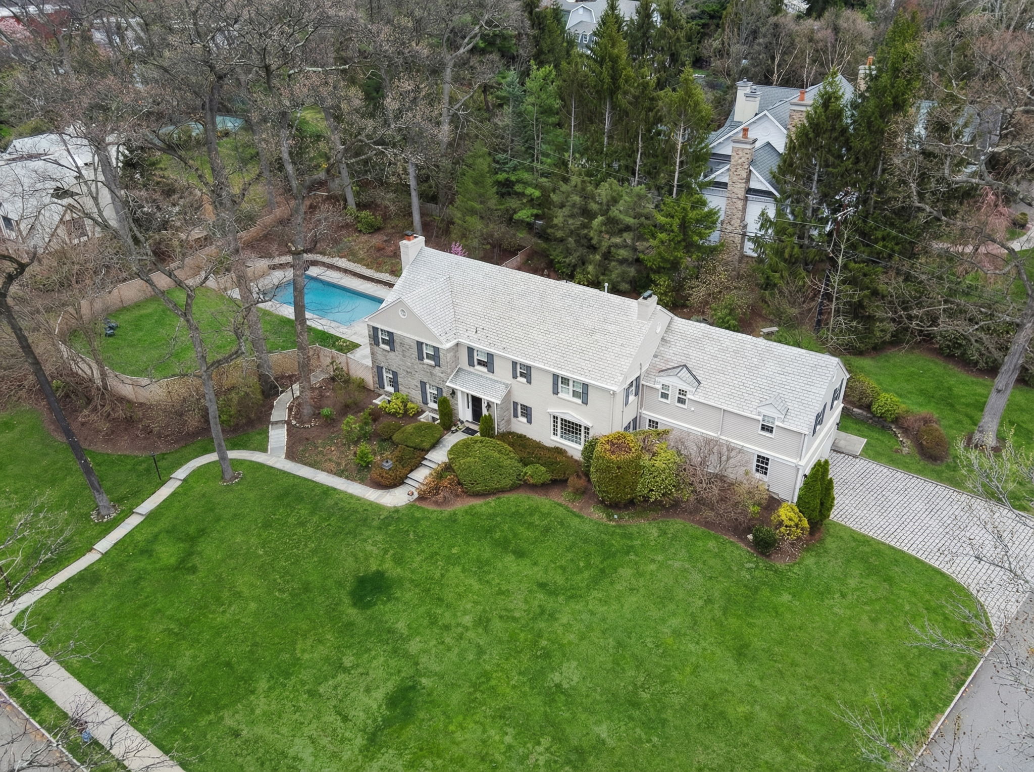 13 miles from NYC with all the charm and convenience of city living without the chaos. The house itself is dreamy: a 1948 mid-century gem on nearly ¾ of an acre, with a pool, waterfall, bluestone patio, and lush lawn that feels like a country escape. Inside, it's sophisticated and serene, with the right updates and functional flow.