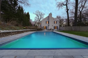 Electric safety pool cover opens and closes with the touch of a button.