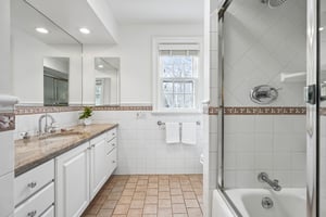 2nd floor has two full hall baths.  Here's #1