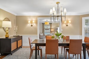 Tailored and timeless, the dining room sets the stage for everything from weeknight dinners to holiday gatherings - beautifully connected to the living spaces beyond and filled with a warm, welcoming light.