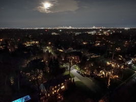 Not photoshopped. The full April moon, the NYC skyline… and your new home, quietly glowing in the lower corner.  Trains & busses to NYC. Or park and ride in Clifton or North Bergen.